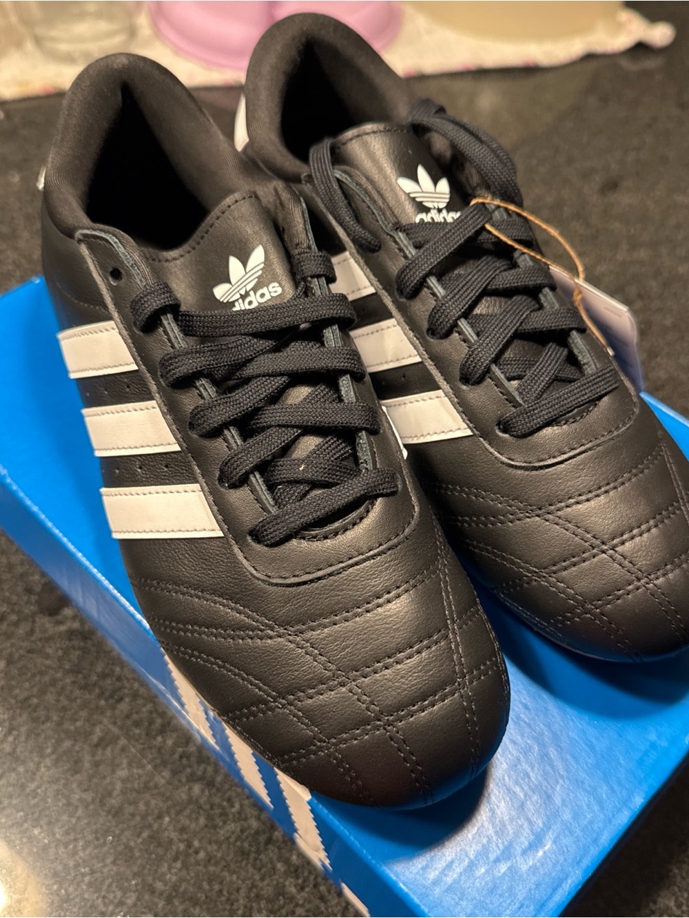 adidas Women’s Black Sneakers with White Three-Stripes